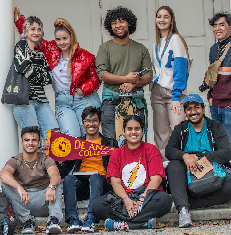 group of students with De Anza pennant