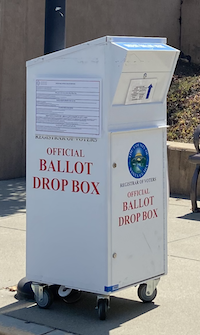 official ballot drop box on sidewalk